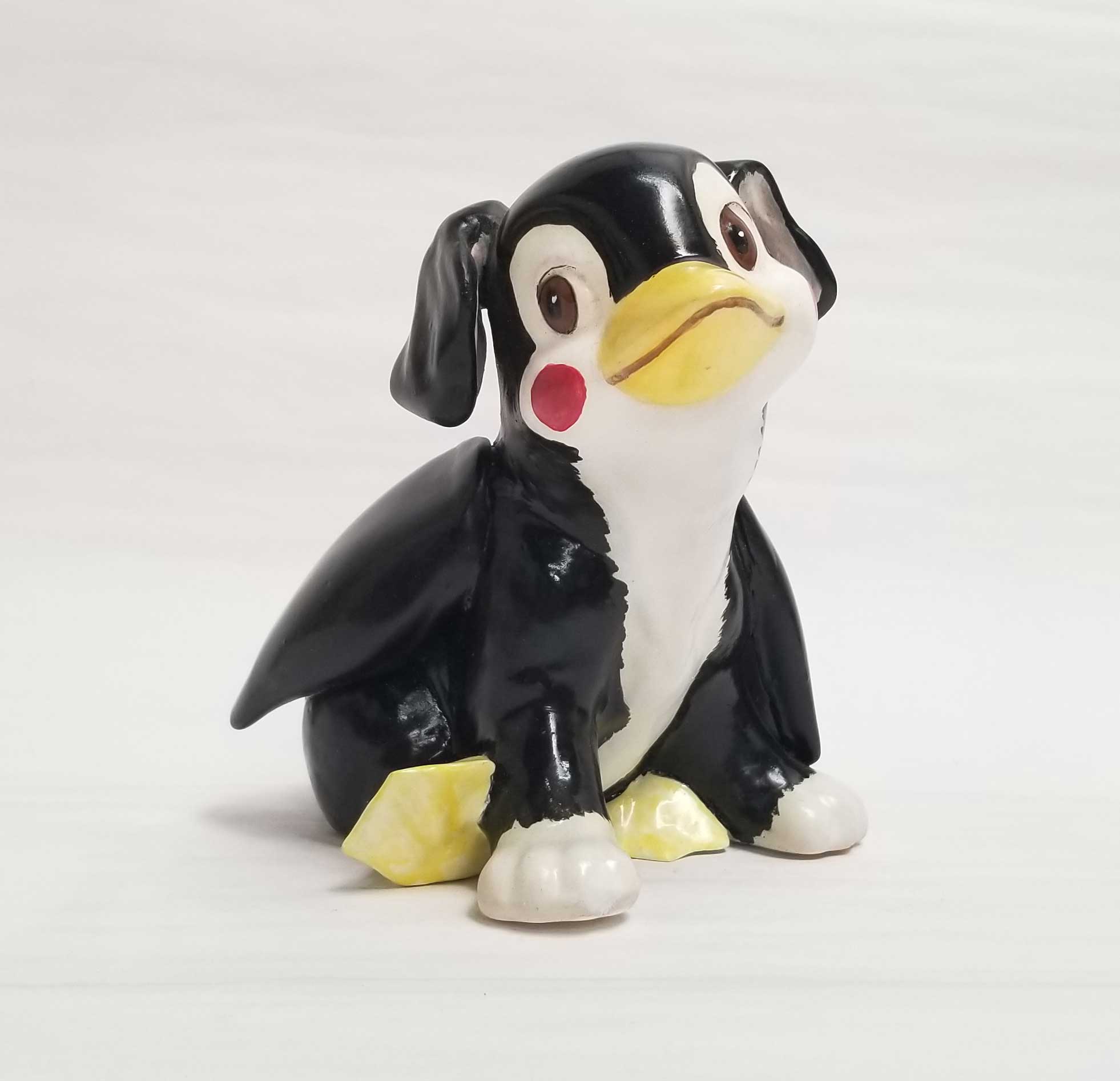 Debra Broz Puppy Penguin, 2021 Mixed media on secondhand ceramic figurines 6 ½” x 4” x 5"