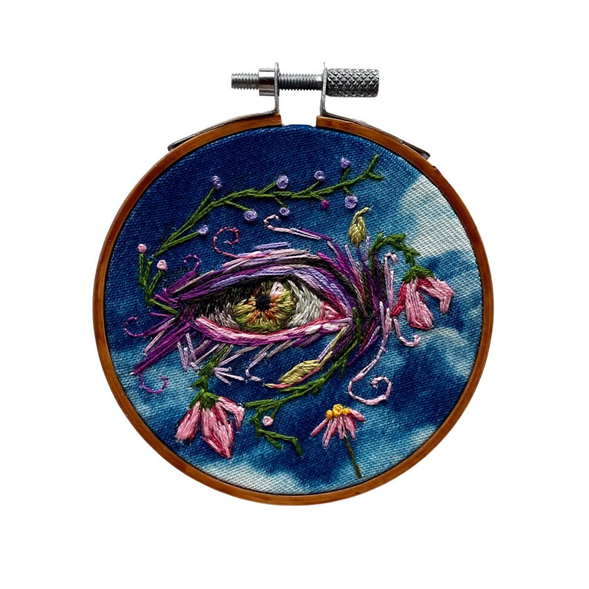 Amber Mustafic Cosmic Eye, 2021 Hand embroidered cyanotype on cotton 3" diameter