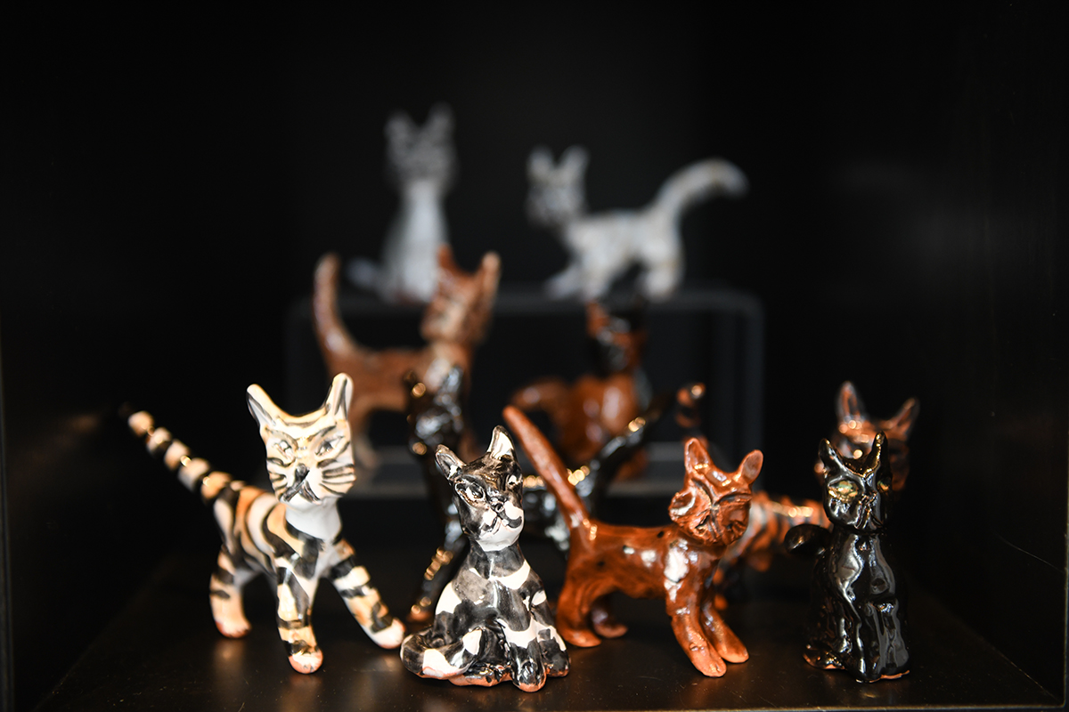 Assorted cat figurines